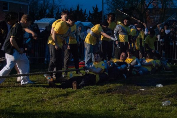 Phi Kappa Sigma fights against Tau Kappa Epsilon in the second rope of the play-in match on Sunday. The Skulls anchor was touched by someone from outside of the pit, causing them to lose the second rope. (Aidan Penca | Northern Star) 