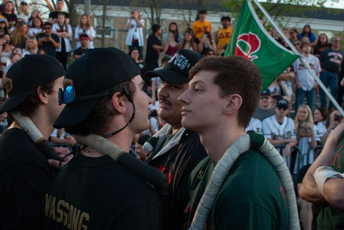 Sigma Nu and Phi Kappa Psi callers try to intimidate each other before deciding sides before the second rope of their semifinal match on Thursday. Sigma Nu was able to come out victorious in their heated rivalry with previous champion Phi Kappa Psi.  (Aidan Penca | Northern Star) 