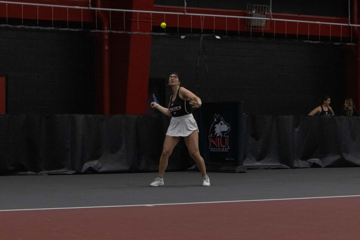 NIU women’s tennis sophomore Irmak Budak prepares to hit the ball during her singles match against the University at Buffalo on March 20. Budak and senior Nataly Ninova were named to the All Mid-American Conference Second Team after the Huskies ended their season with a loss to Ball State University. (Northern Star file photo)